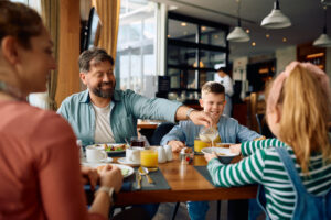 Family enjoying Veterans Day Free Meals